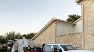 truck outside of apartment complex Photo